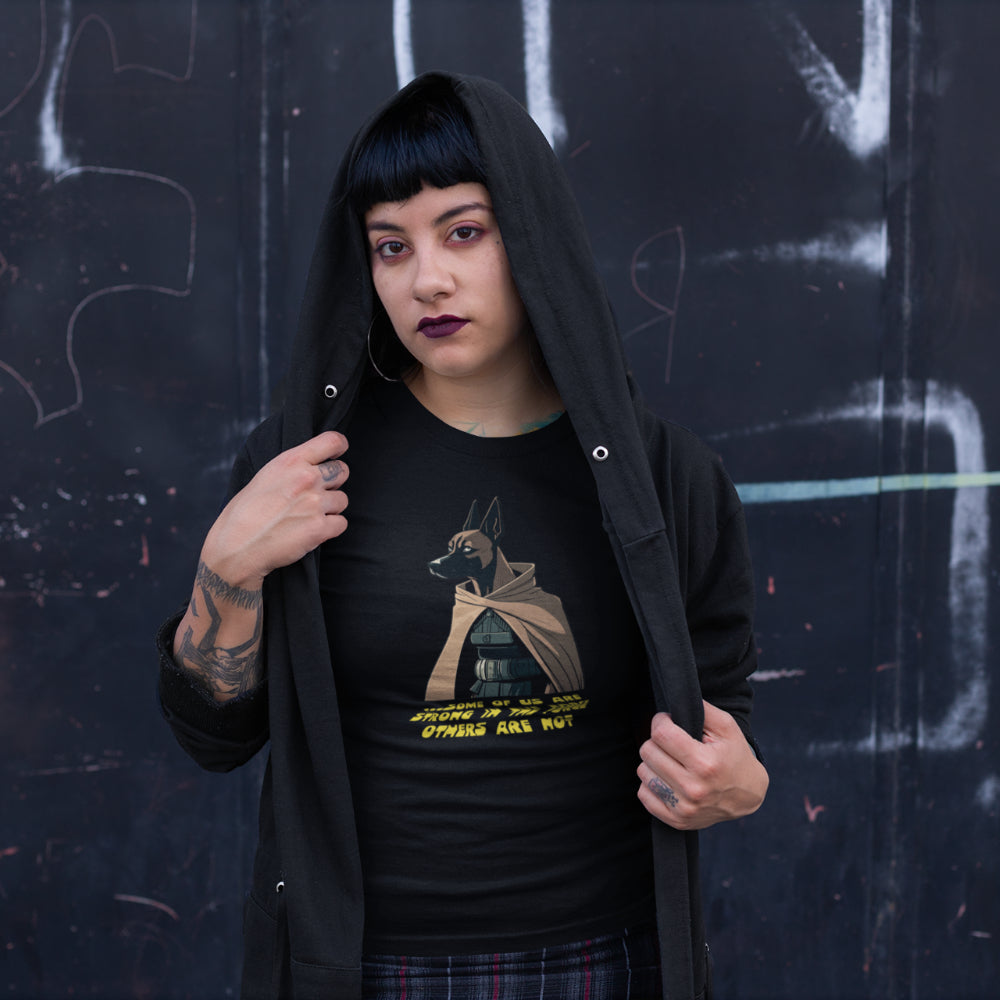 Woman in black T-shirt featuring a Belgian Malinois illustration dressed as a Jedi with the caption 'Some of us are strong in the force, others are not