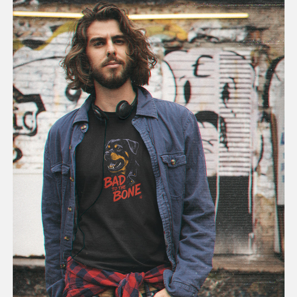 Men in a black T-shirt with street-style Rottweiler illustration and “Bad to the Bone” slogan in red. Bold gift for dog lovers with attitude.