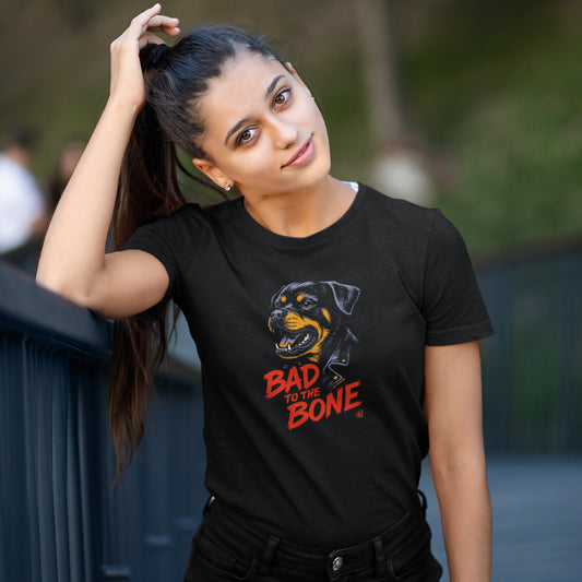 Women in a black T-shirt with street-style Rottweiler illustration and “Bad to the Bone” slogan in red. Bold gift for dog lovers with attitude.