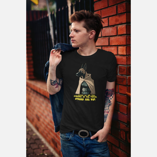 Man in b
lack T-shirt featuring a Belgian Malinois illustration dressed as a Jedi with the caption 'Some of us are strong in the force, others are not