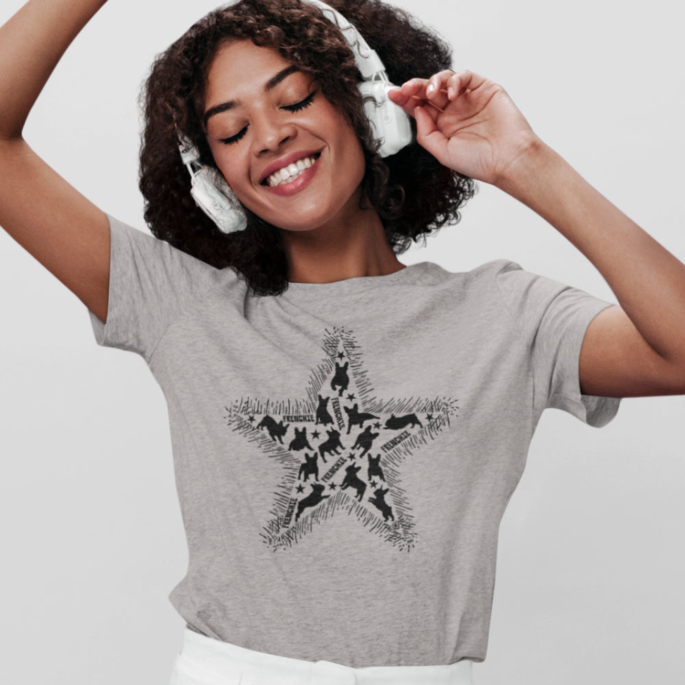 Women in a heather grey organic cotton T-shirt featuring a large black star graphic filled with dog silhouettes and surrounded by sketchy fur-like edges