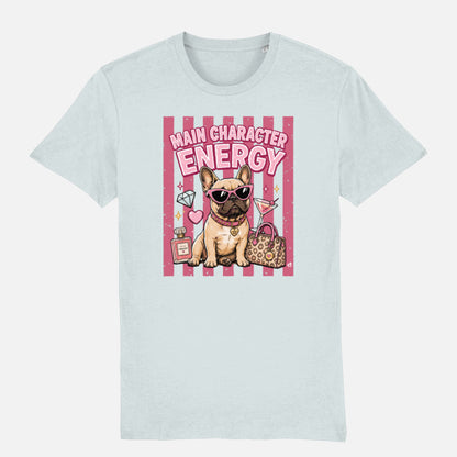 A light blue crewneck t-shirt featuring a graphic print of a French Bulldog wearing sunglasses, next to a pink striped background with the text 'MAIN CHARACTER ENERGY'.