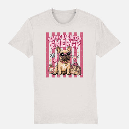 An off-white crewneck t-shirt featuring a colourful graphic print of a French Bulldog wearing sunglasses, next to a pink striped background with the text 'MAIN CHARACTER ENERGY' and accessories.
