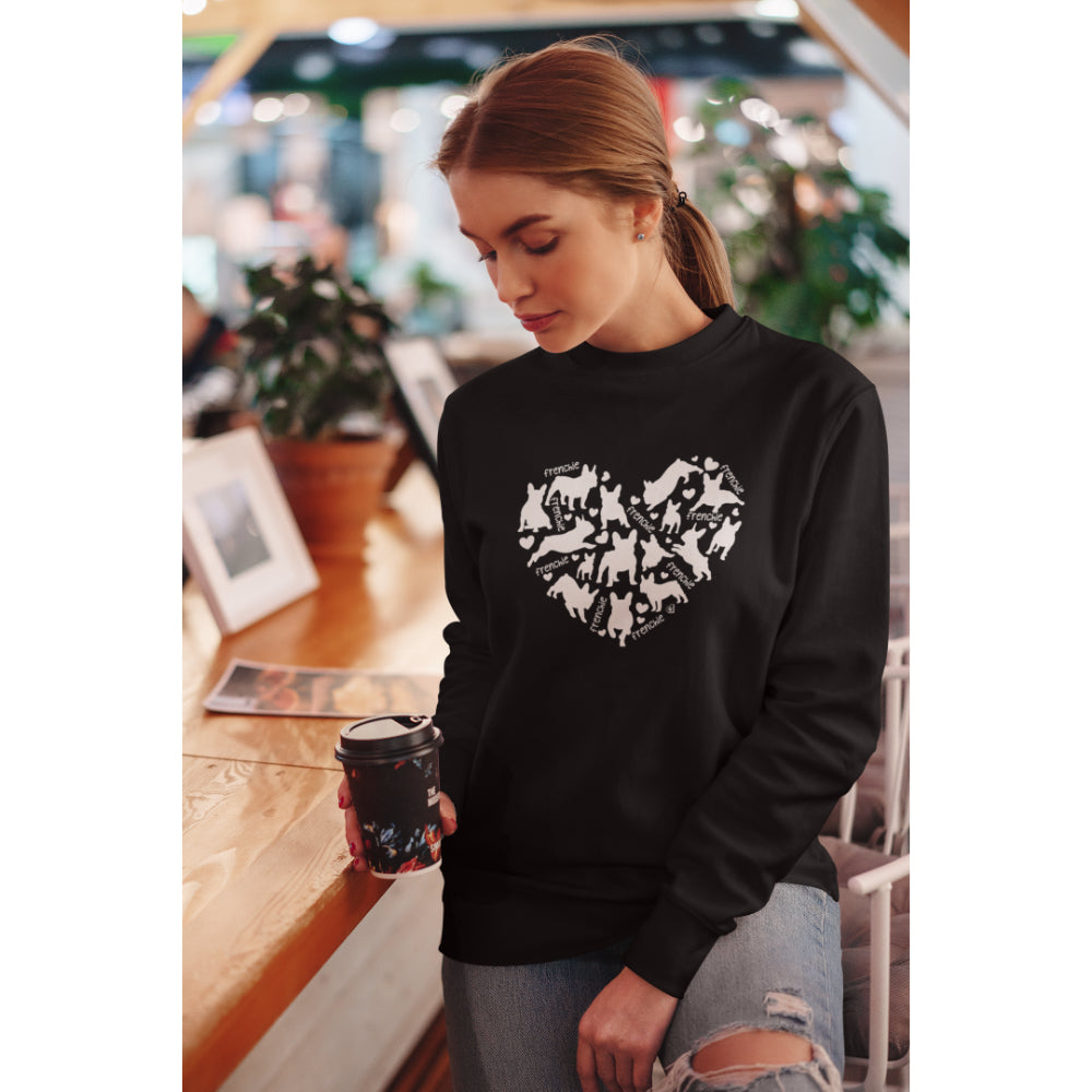 A women in a black 85% organic cotton sweatshirt featuring a heart-shaped design of French Bulldog silhouettes in white, perfect for dog lovers