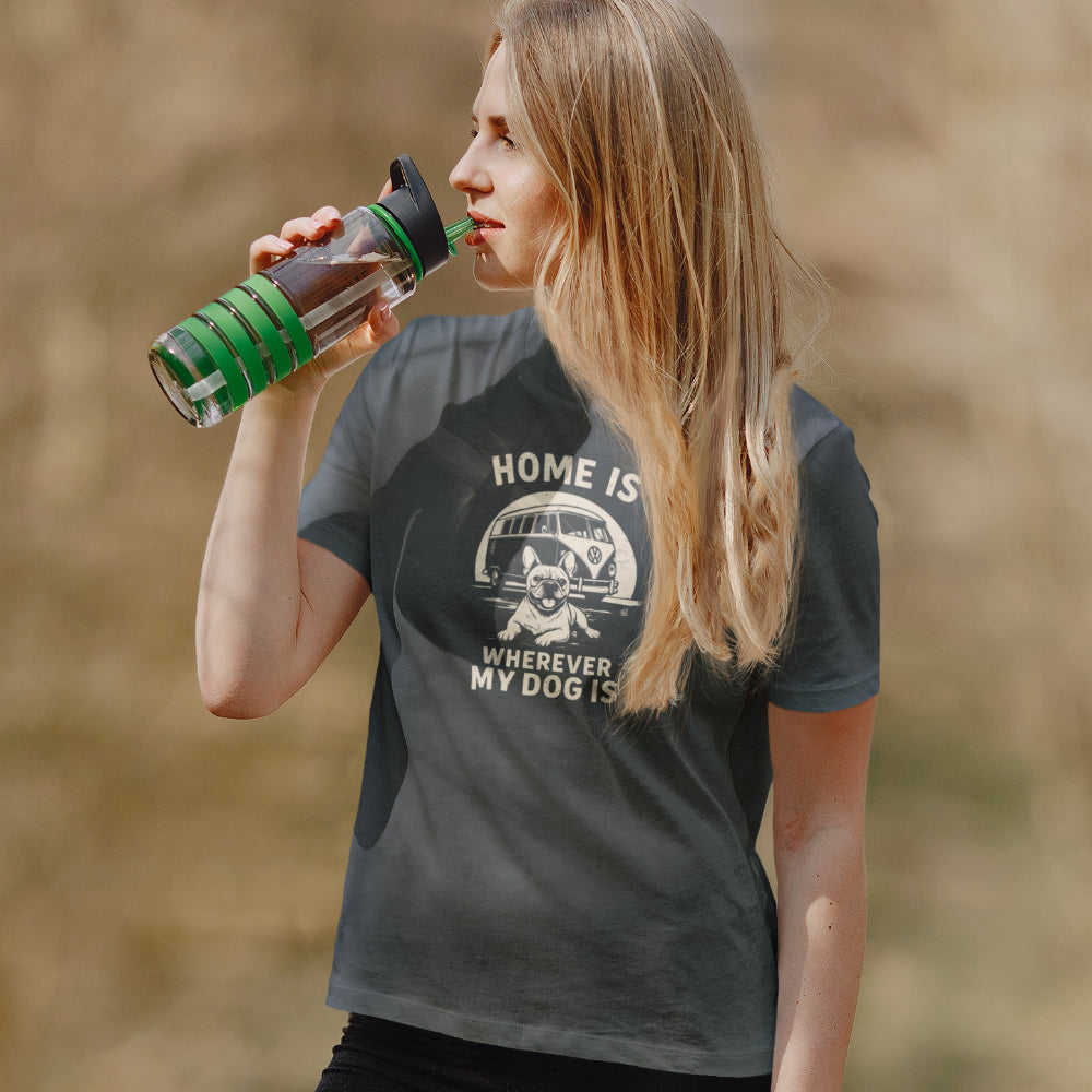 Women in an anthracite T-shirt with retro camper-van and dog illustration and the text ‘Home Is Wherever My Dog Is.’