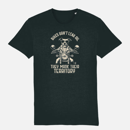 Black T-shirt featuring a biker-style Jack Russell Terrier riding a motorcycle, wearing sunglasses and a leather jacket, with the slogan “Bikes Don’t Leak Oil, They Mark Their Territory” printed above and below the illustration in a vintage font.