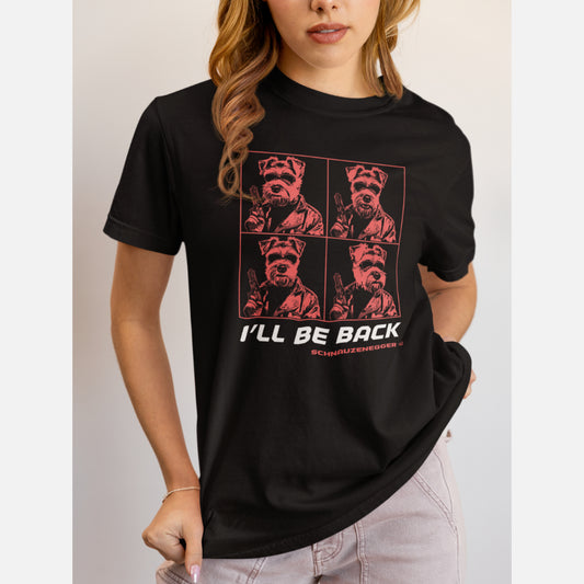 Woman in a black unisex Schnauzer T-shirt with four-panel pop-art design in red. “I’LL BE BACK” slogan and SCHNAUZENEGGER parody, printed on organic cotton.