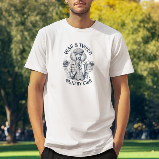 Men in a white T-shirt featuring a vintage-style illustration of a Poodle in tweed jacket and cap, with “Wag & Tweed Country Club” text arched above and below, set against a countryside background.