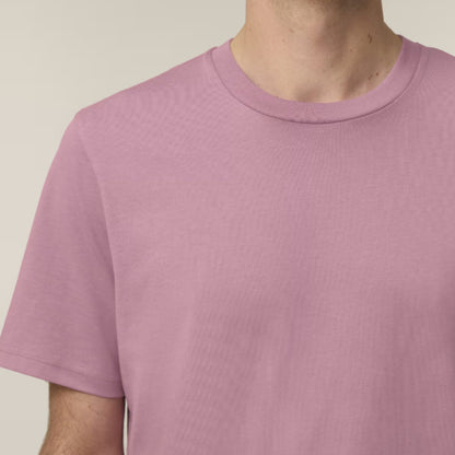 Person wearing a Lilac Dream coloured t-shirt against a neutral background
