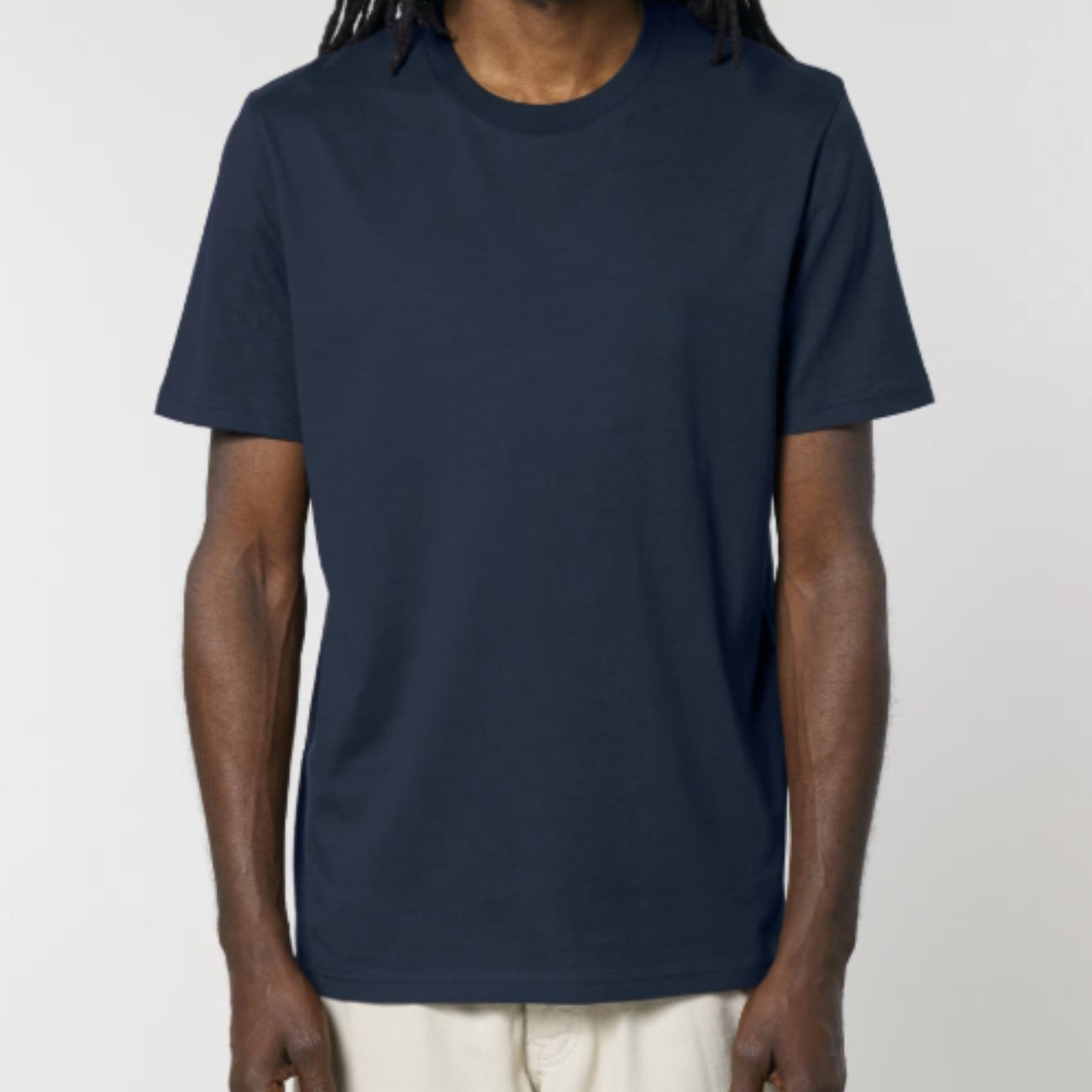 Person wearing a navy blue t-shirt against a plain background